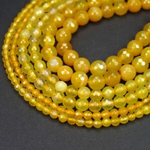 Agate ball faceted yellow 4 – 12 mm, 1 strand