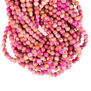 Impression boule de jaspe rose 4-10 mm, 1 fil