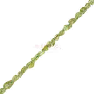 Peridot nuggets green 4 x 8 mm, 1 strand
