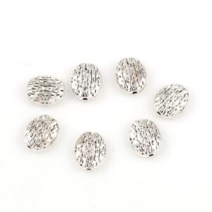 Metal bead flat oval patterned 13 x 11 mm