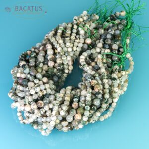 Construction agate ball faceted white green 6-8mm, 1 strand