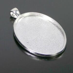 Sertissage pendentif pour cabochons ovale 40×30 mm métal argenté