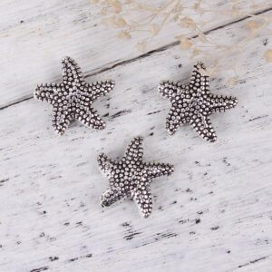 Perline di metallo stelle marine pois 14 mm, 3 pezzi