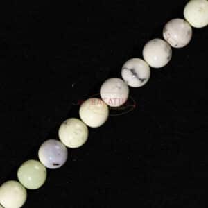 American turquoise ball glossy white-yellow approx. 4-8mm, 1 strand