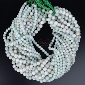 Jadeite plain round faceted light green approx. 6-8mm, 1 strand