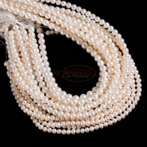 A-grade freshwater pearls “almost round” creamy white size selection, 1 strand