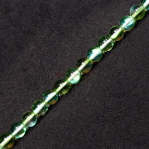 Rock crystal ball glossy green shimmer 8 mm, 1 strand